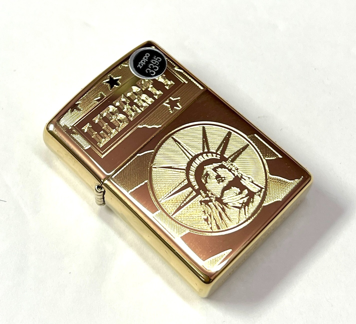 Zippo Lighter 254B Gold Liberty and US Flag Laser Lettering Pattern Brand New.