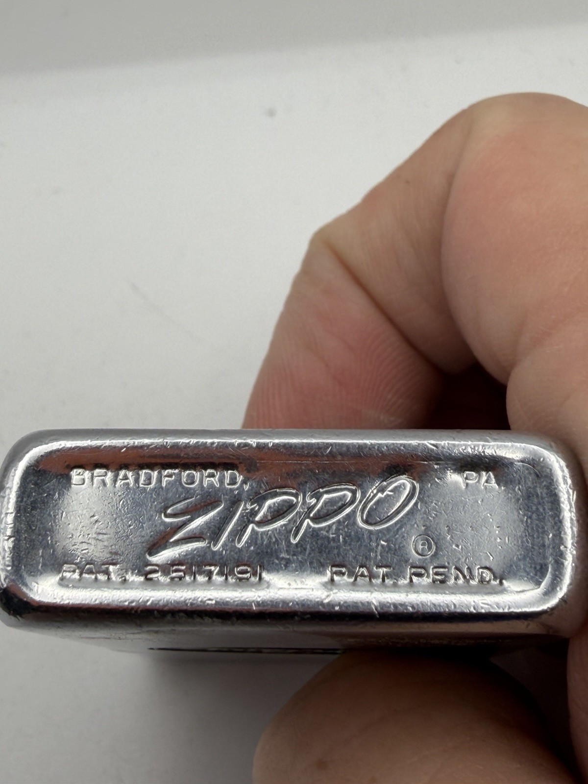Vintage 1958 De Long Logo Advertising Chrome Zippo Lighter