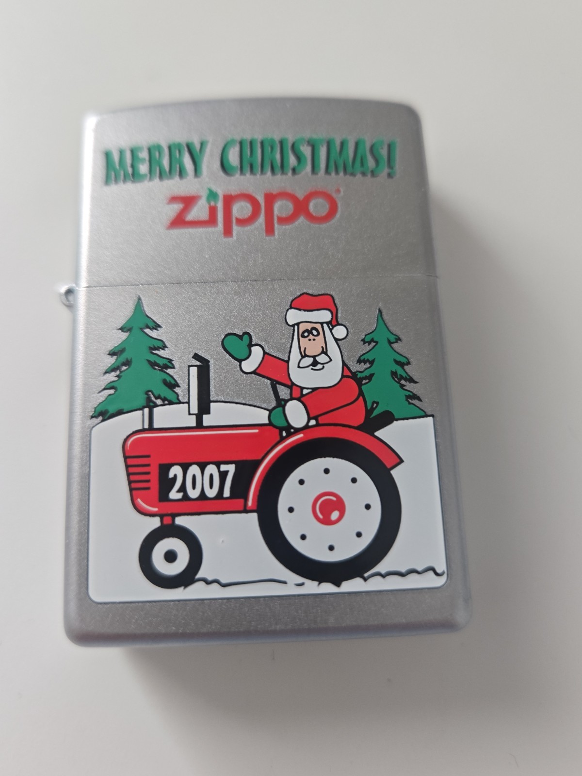 2007 ZIPPO LIGHTER CHRISTMAS ZIPPO SANTA ON A TRACTOR BRUSHED CHROME
