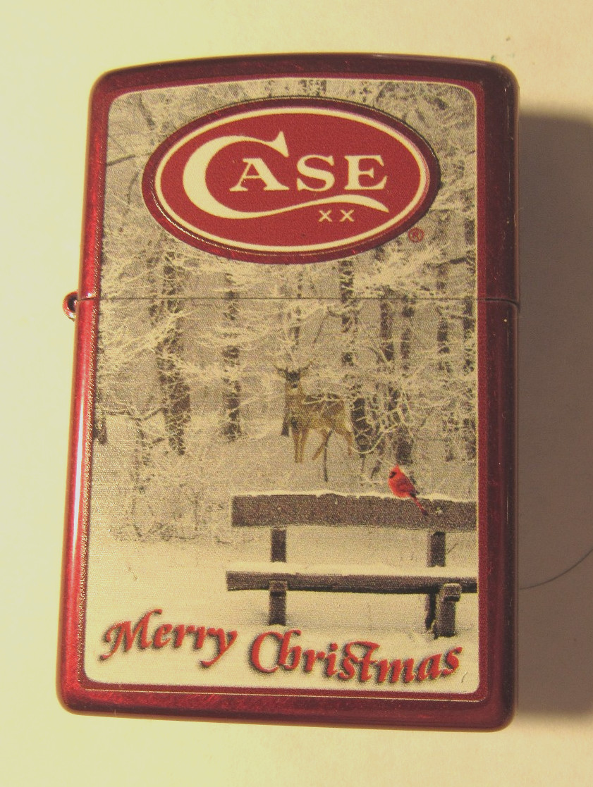 2013 Case Merry Christmas Zippo Lighter NIB Cardinal, deer and snow scene.