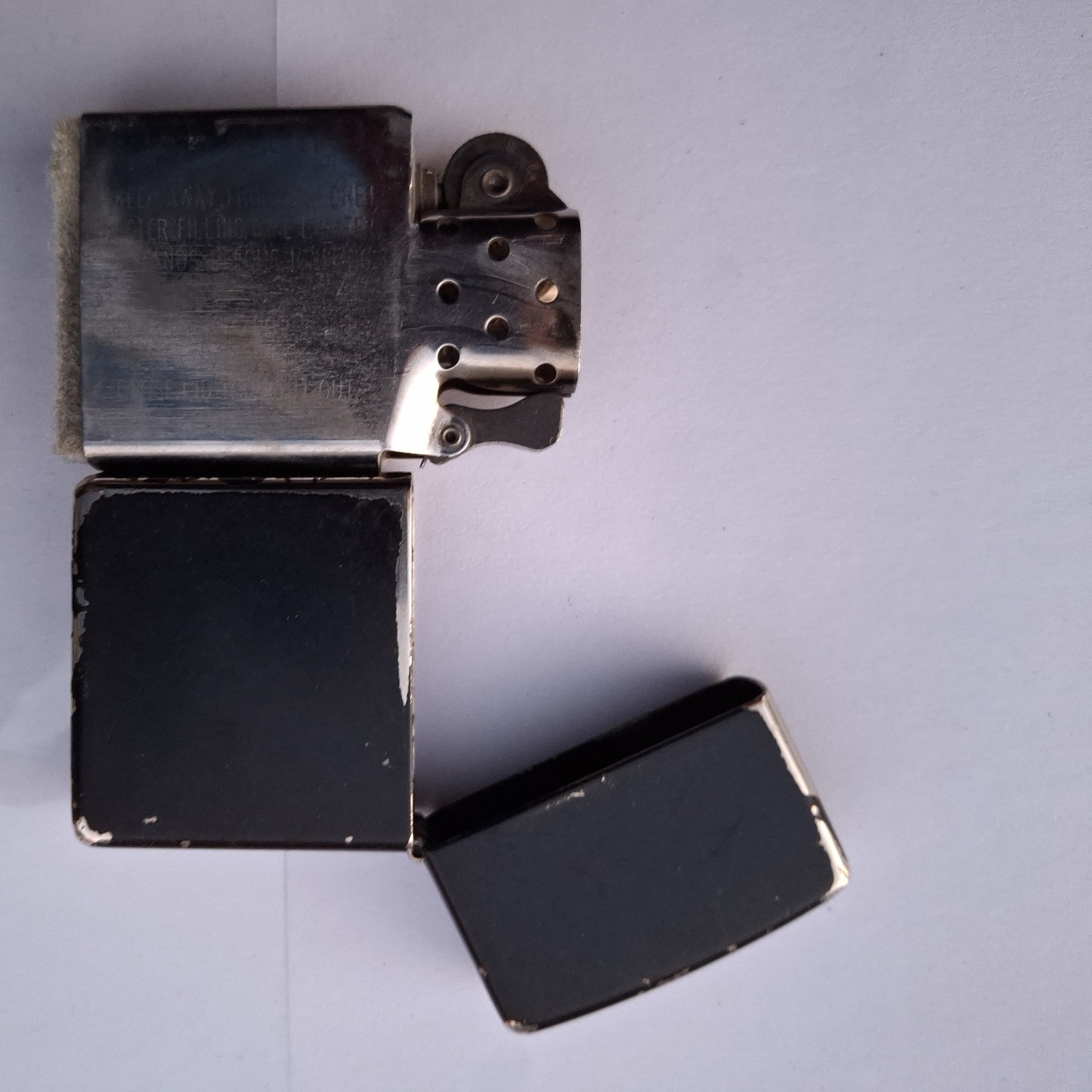 2 zippos for $20