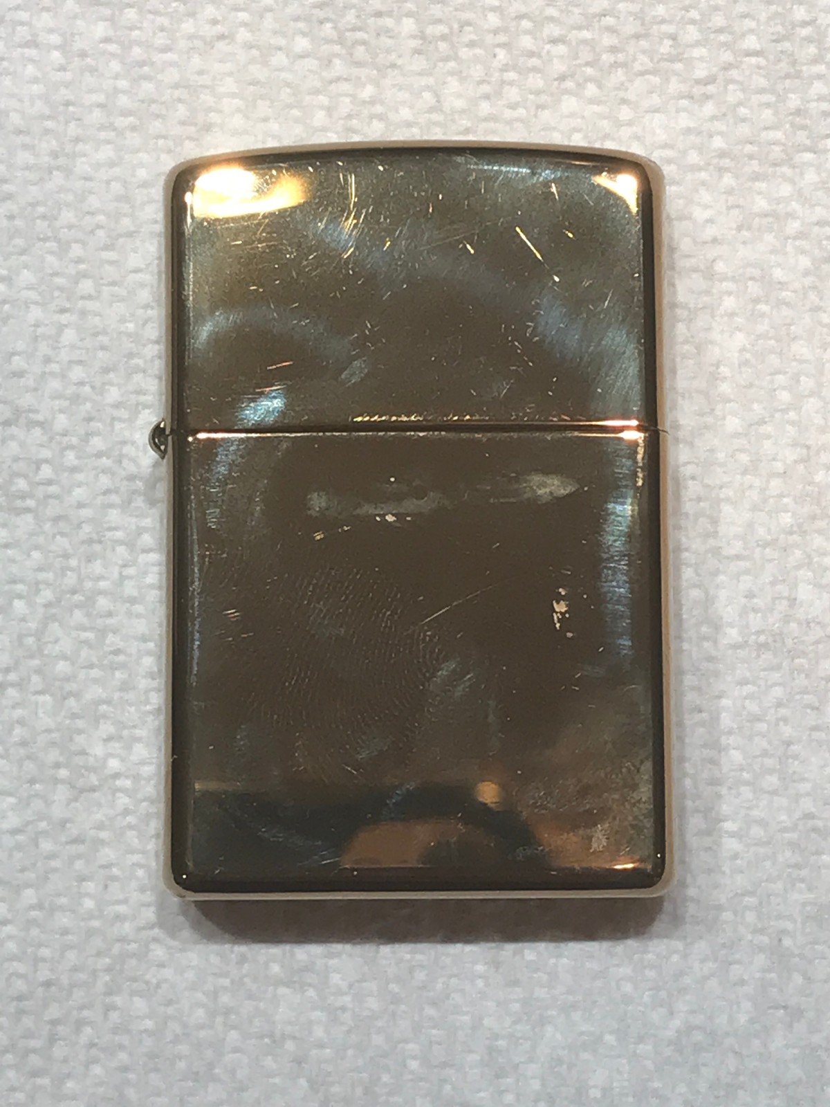 CLASSIC GOLD TONE ZIPPO LIGHTER MADE IN BRADFORD,PA. U.S.A. THE CODE IS D 05