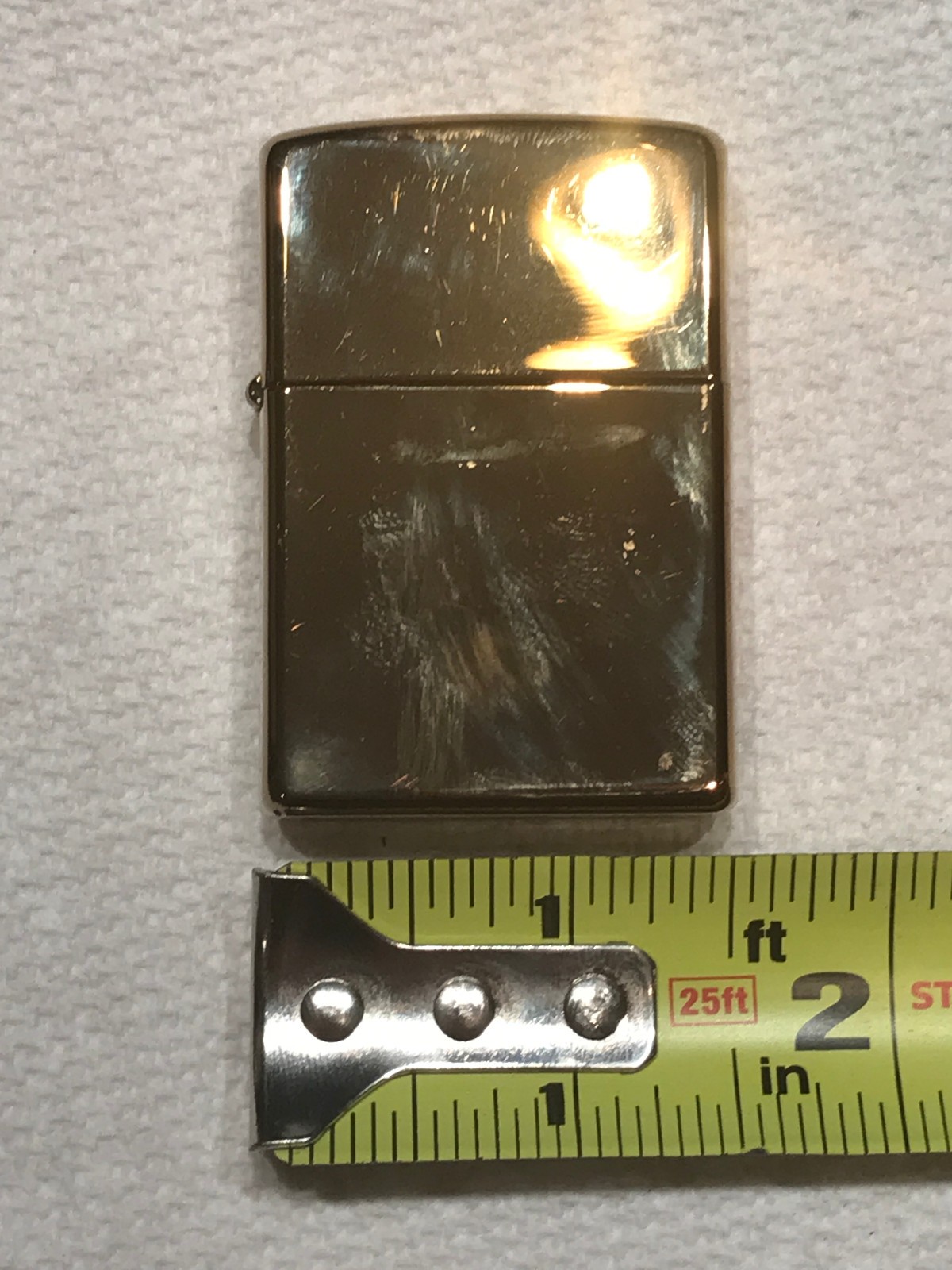 CLASSIC GOLD TONE ZIPPO LIGHTER MADE IN BRADFORD,PA. U.S.A. THE CODE IS D 05