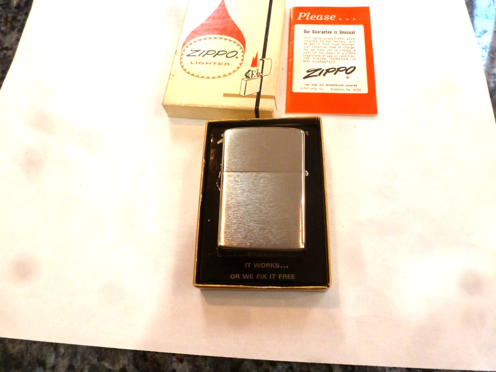 1974 ZIPPO GENERAL ELECTRIC „SOS OUR 1974 CHALLENGE“ LIGHTER MIB MINT IN BOX