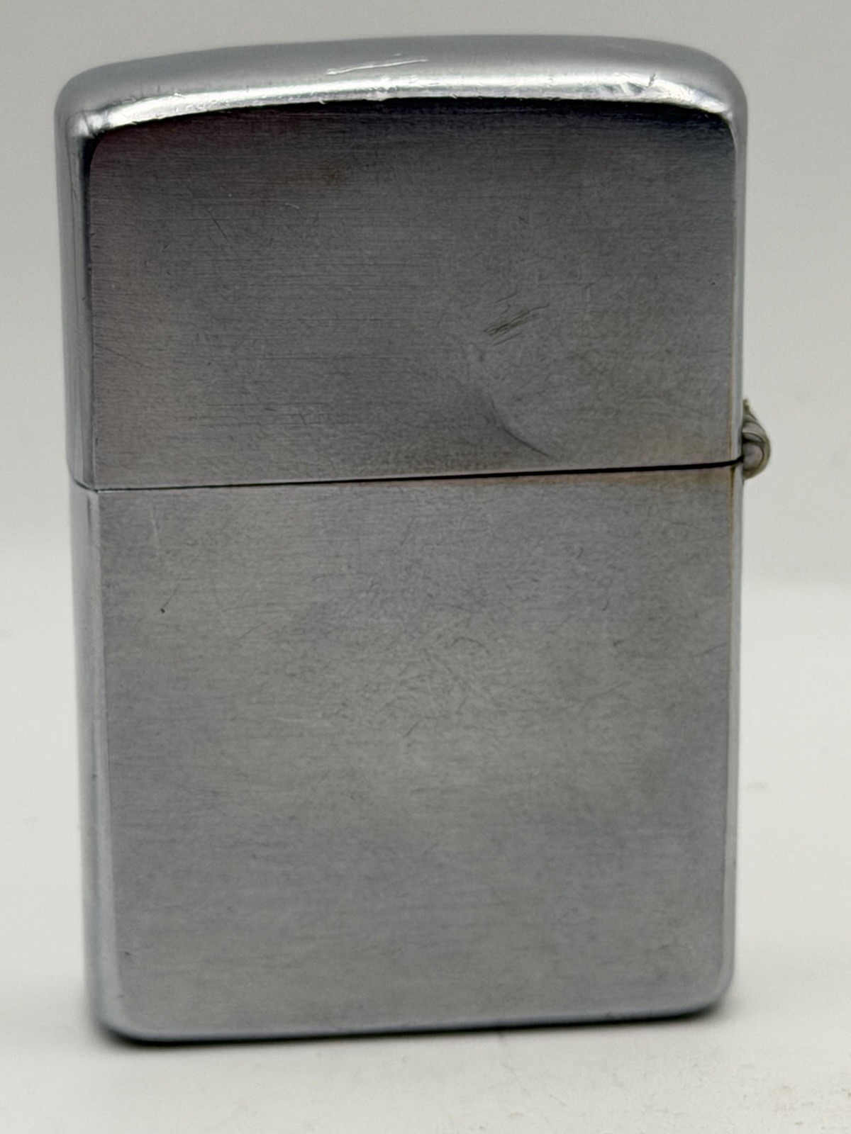 Vintage 1958 De Long Logo Advertising Chrome Zippo Lighter
