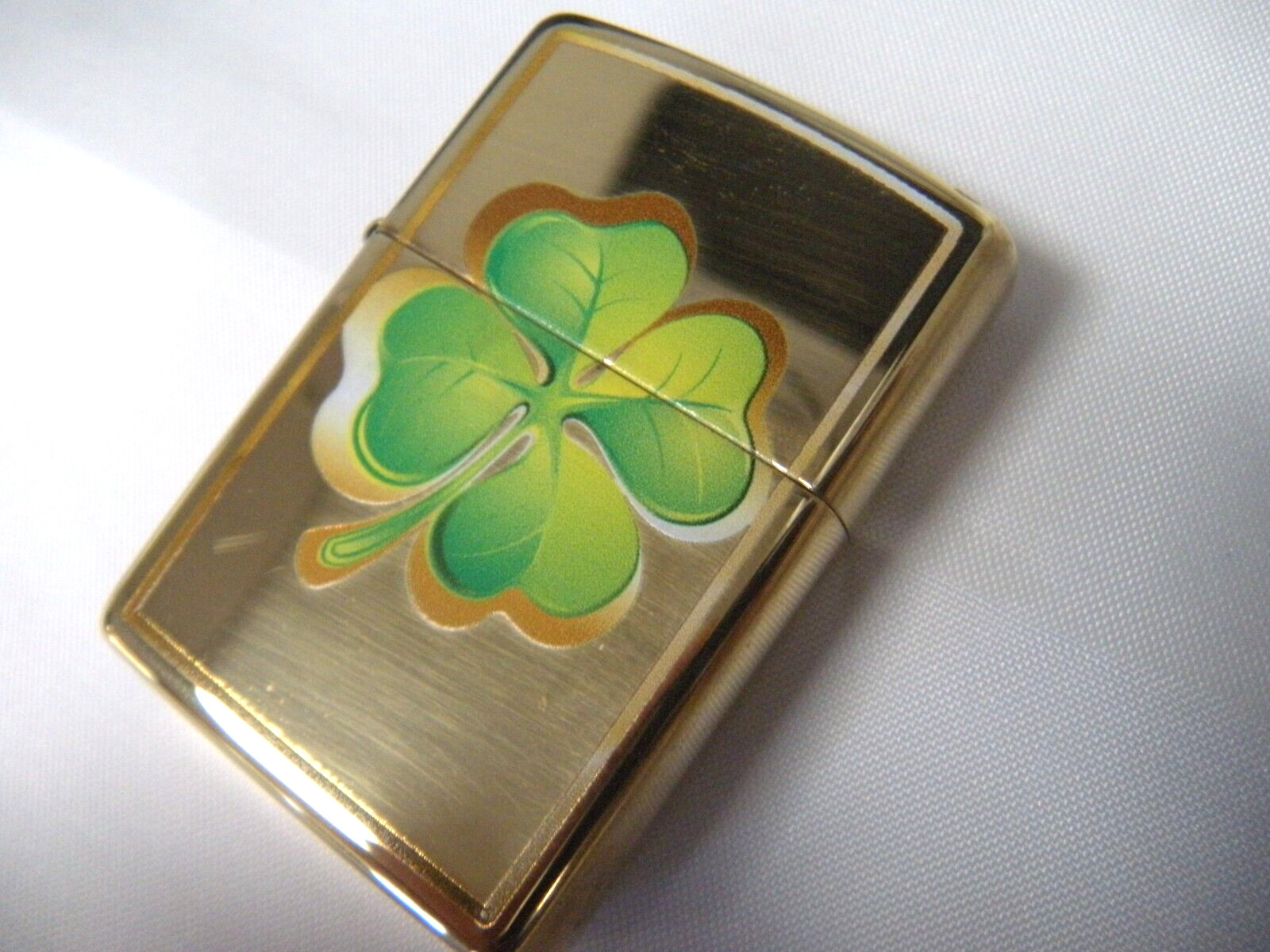 Zippo 4 Leaf Clover Shamock Lighter New in Box Unfired Gold Colored Made In USA