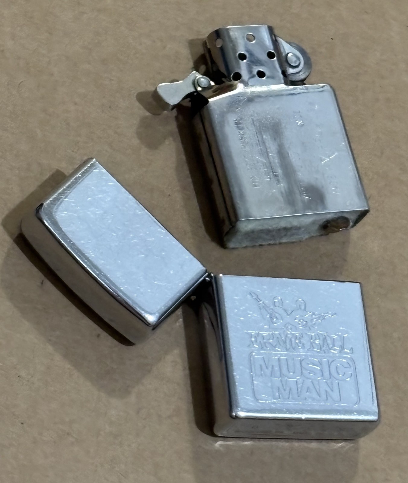 Zippo 1996 Ernie Ball Music Man Engraved Lighter • G XII • Fired • Strong Spark