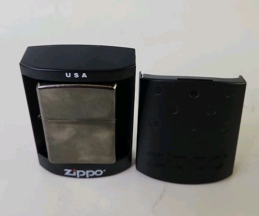 New Old Stock Zippo Lighter, Never opened In original plastic Zippo box 2006
