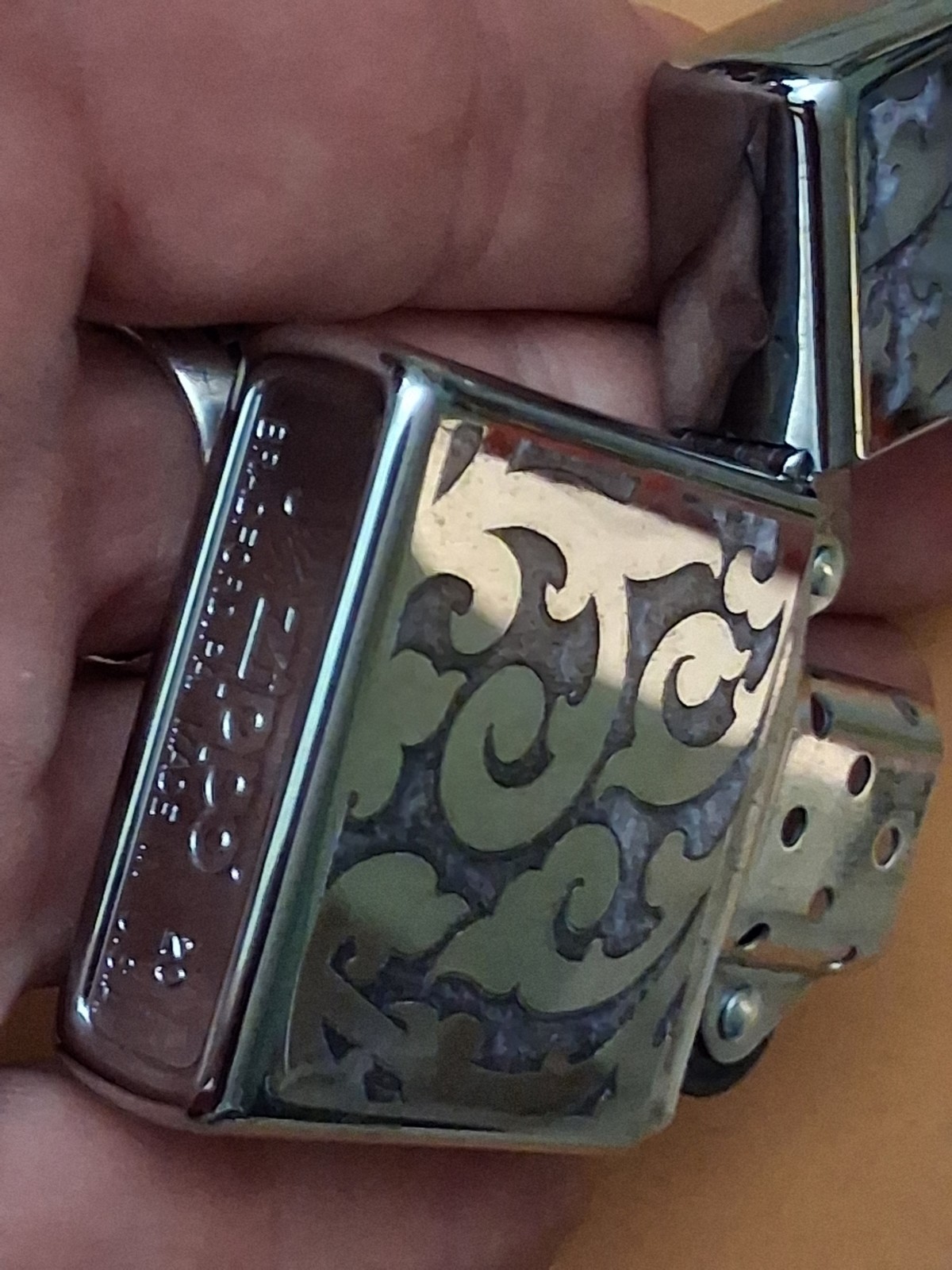 ZIPPO Lighter Struck once or twice Silver Tone Engraved Pearlized look