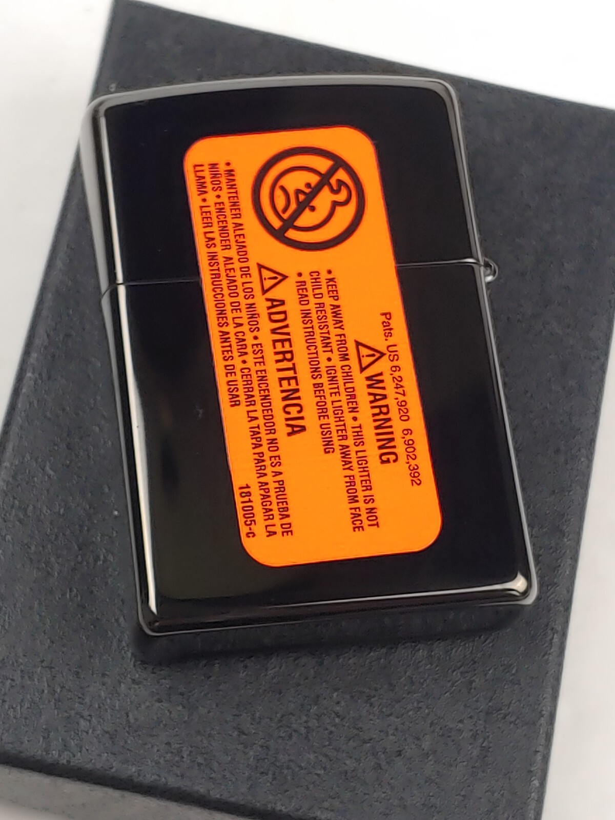 Zippo 28678 ZIPPO SKULLS on High Polish Black Windproof Lighter – FEB (B) 2014
