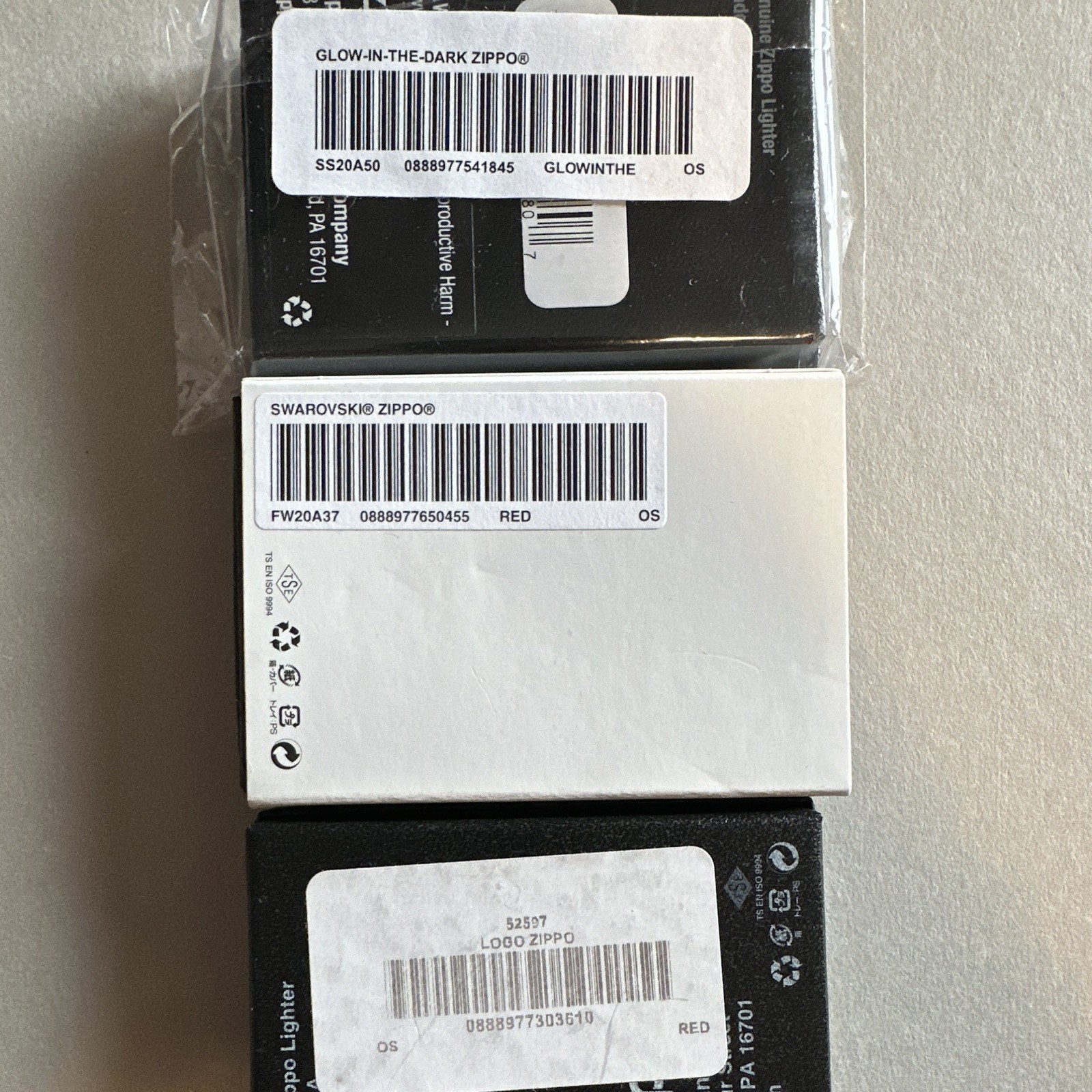 Zippo Lot of 3 Lighters in Boxes: Supreme Red Logo, Swarovski Red, Glow-in-Dark
