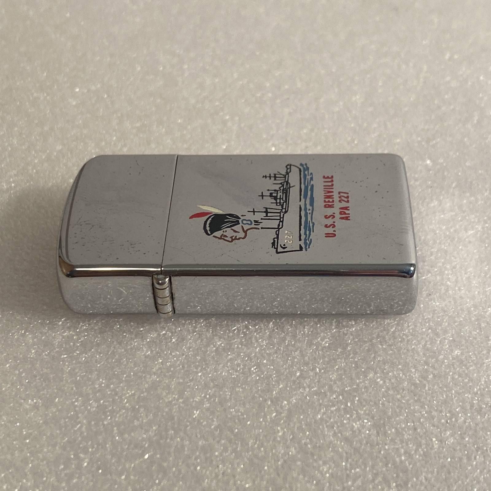 VINTAGE ZIPPO SLIM SHIP LIGHTER U.S.S. RENVILLE APA 227