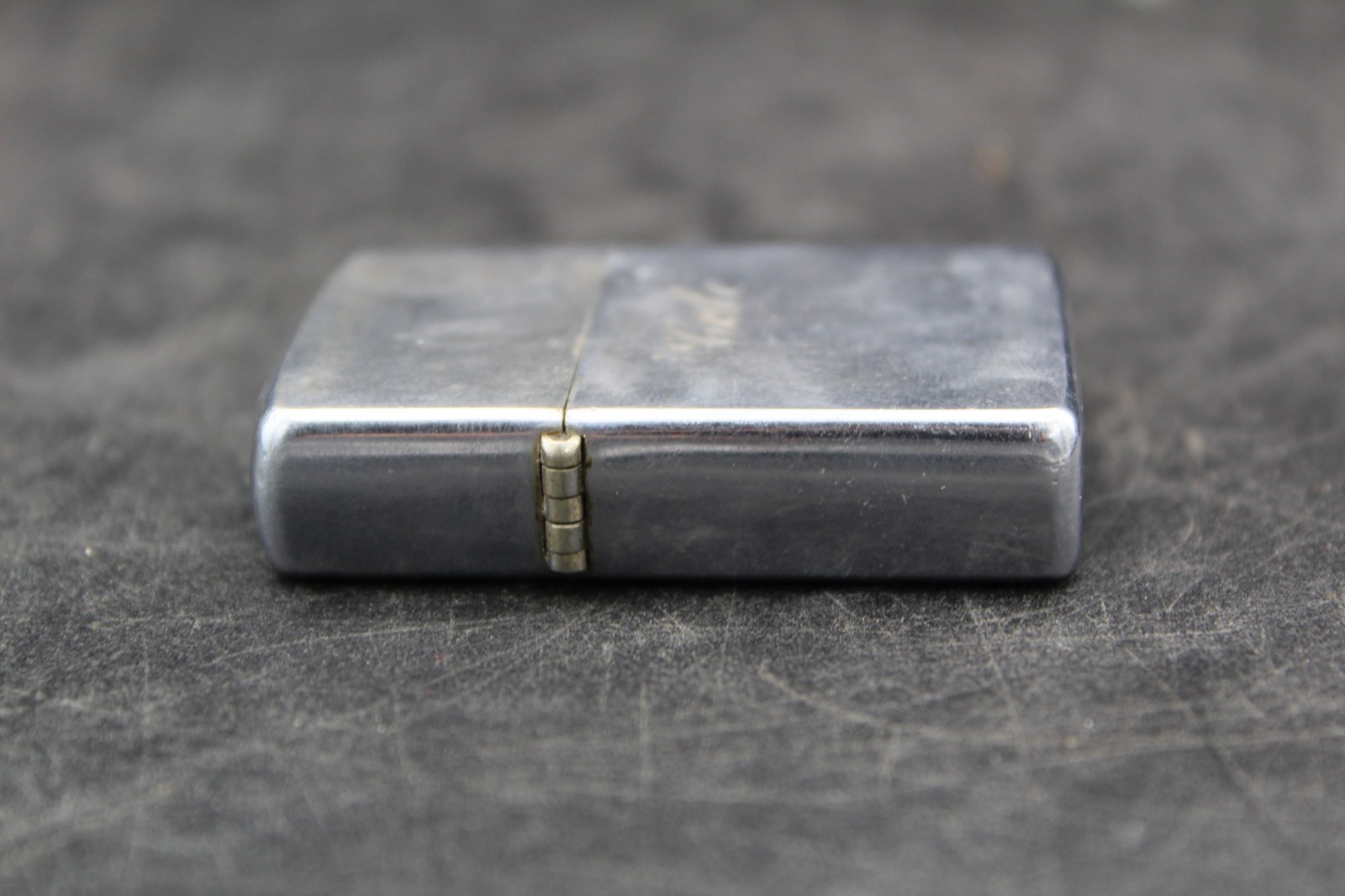 Zippo Lighter 2-1/4” X 1-1/8”.