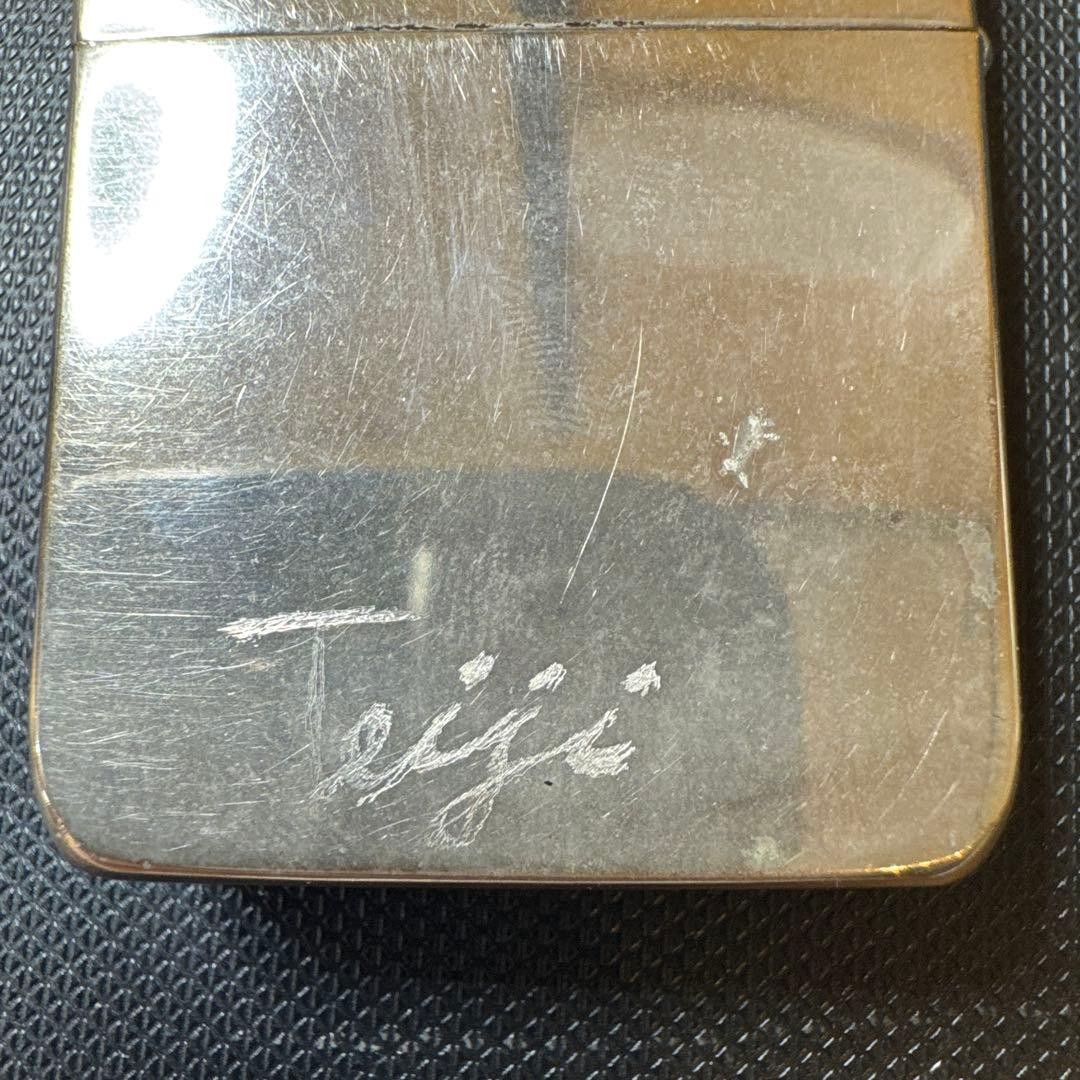 ZIPPO guarantee engraved silver