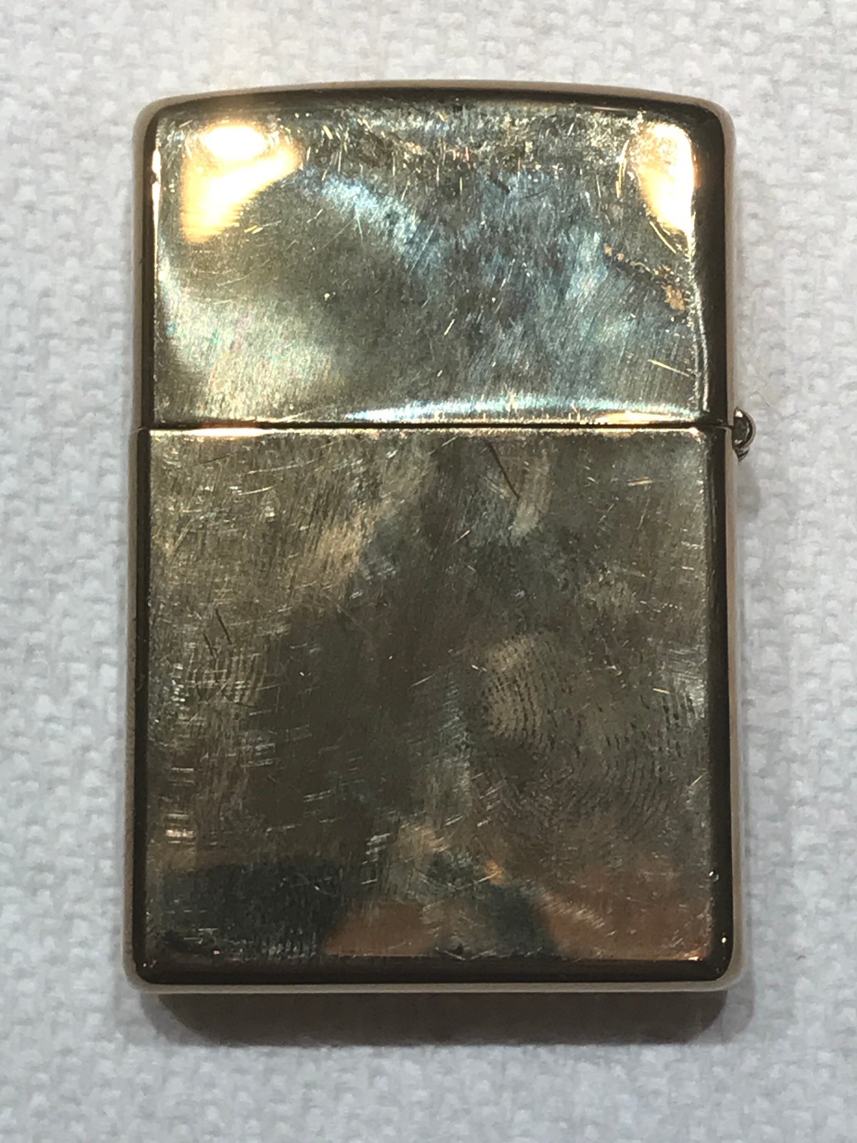 CLASSIC GOLD TONE ZIPPO LIGHTER MADE IN BRADFORD,PA. U.S.A. THE CODE IS D 05