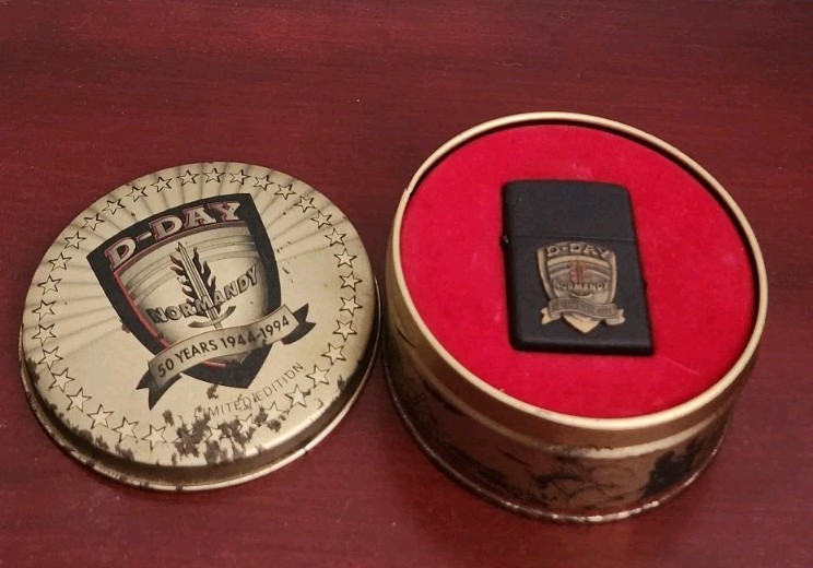 D-DAY NORMANDY 50 YEARS 1944-1994 50 YEARS ZIPPO LIGHTER. W/TIN CASE. SPARKS