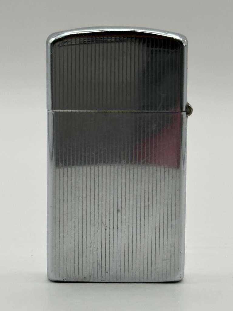 Vintage 1957 Zippo Slim Chrome Fleur De Lis Etched Pocket Lighter Pat Pending US