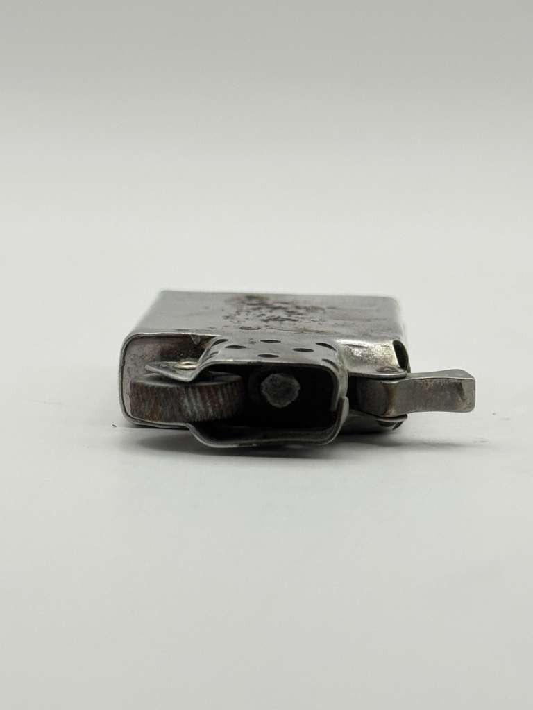 Vintage 1957 Zippo Slim Chrome Fleur De Lis Etched Pocket Lighter Pat Pending US