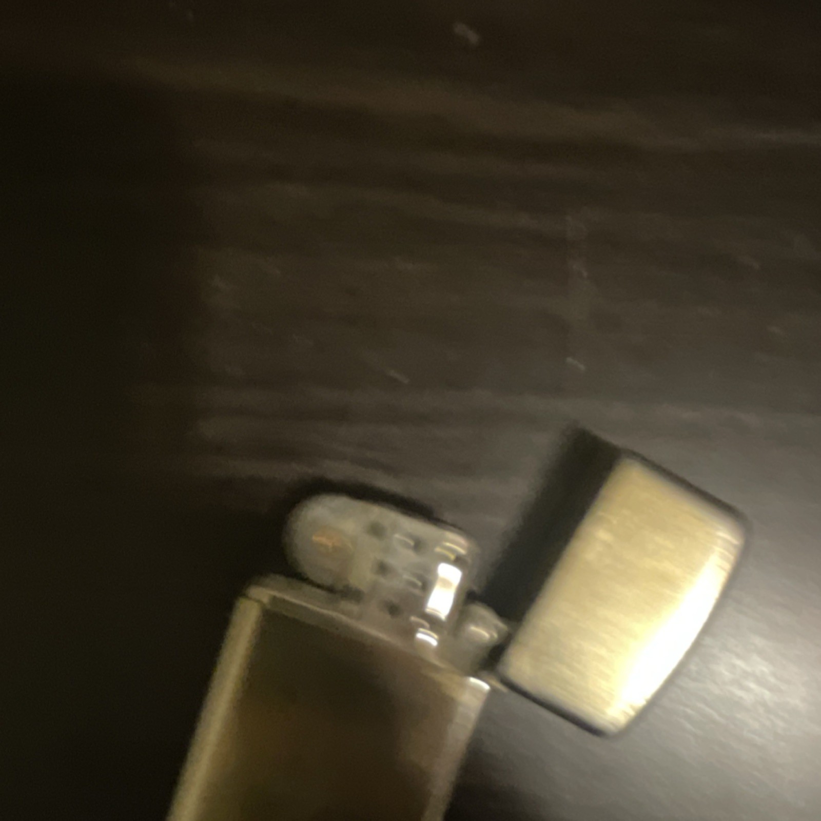 Zippo Gold-Tone Collectible Lighter with Diagonal Stripe Pattern Design