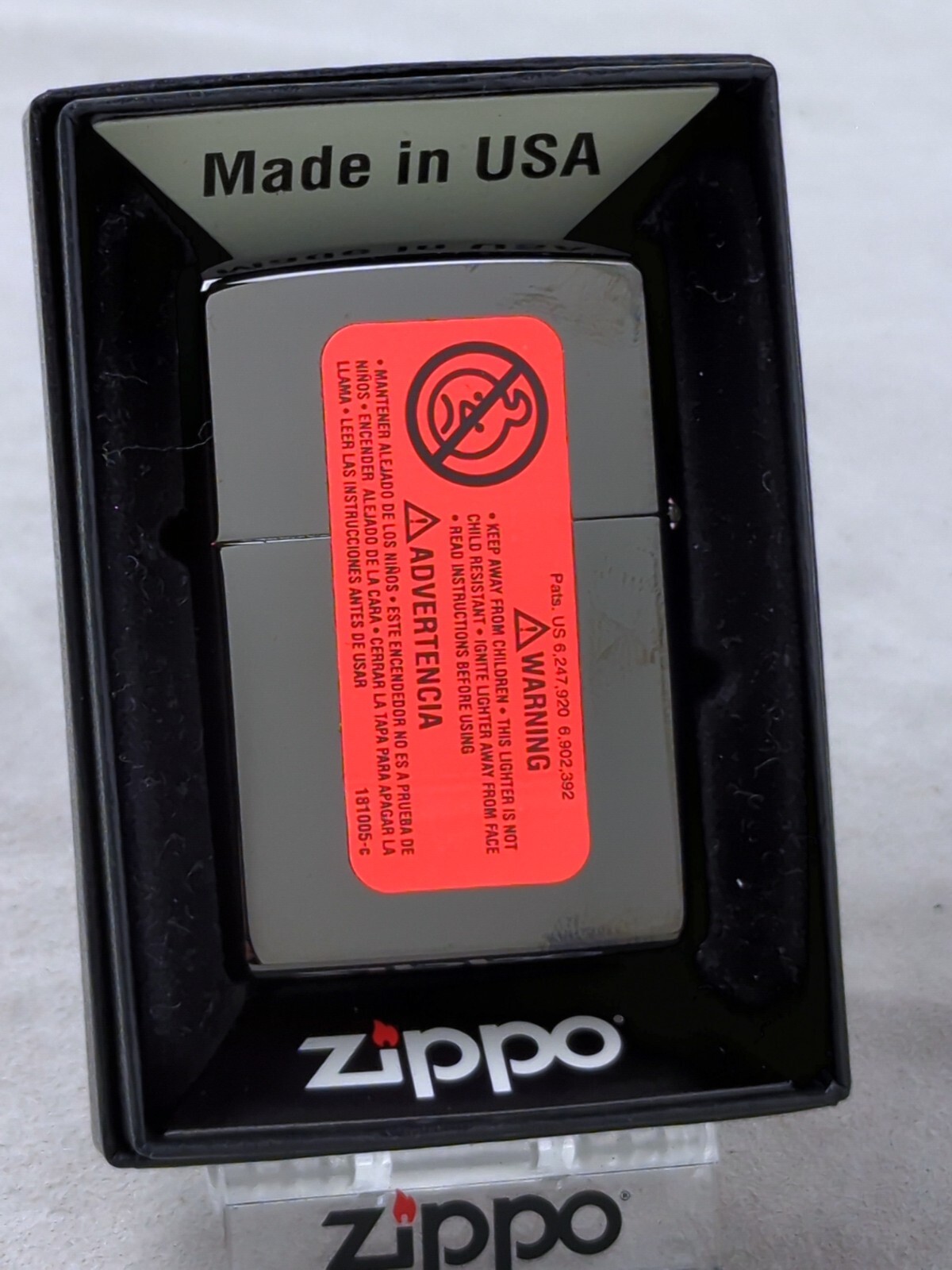 Zippo 49117 SPLIT FACE DESIGN on High Polish Black Windproof Lighter MARCH 2019