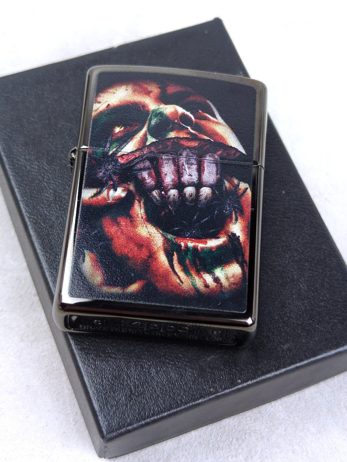 Zippo 49117 SPLIT FACE DESIGN on High Polish Black Windproof Lighter MARCH 2019