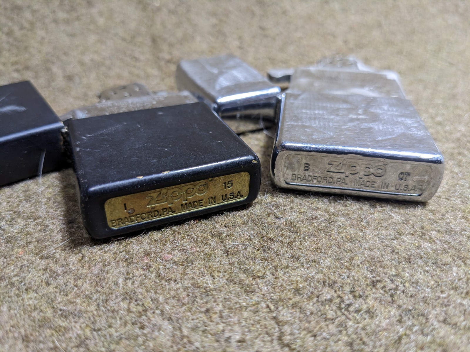 Pair Of Zippo Lighters Black & Playboy Silver Both Need Maintenance