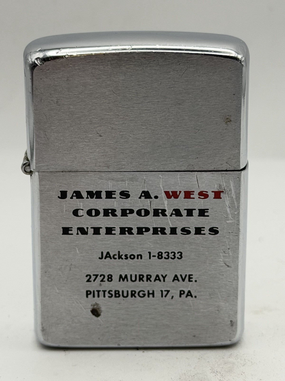 Vintage 1960 James West Corporate Advertising Chrome Zippo Lighter