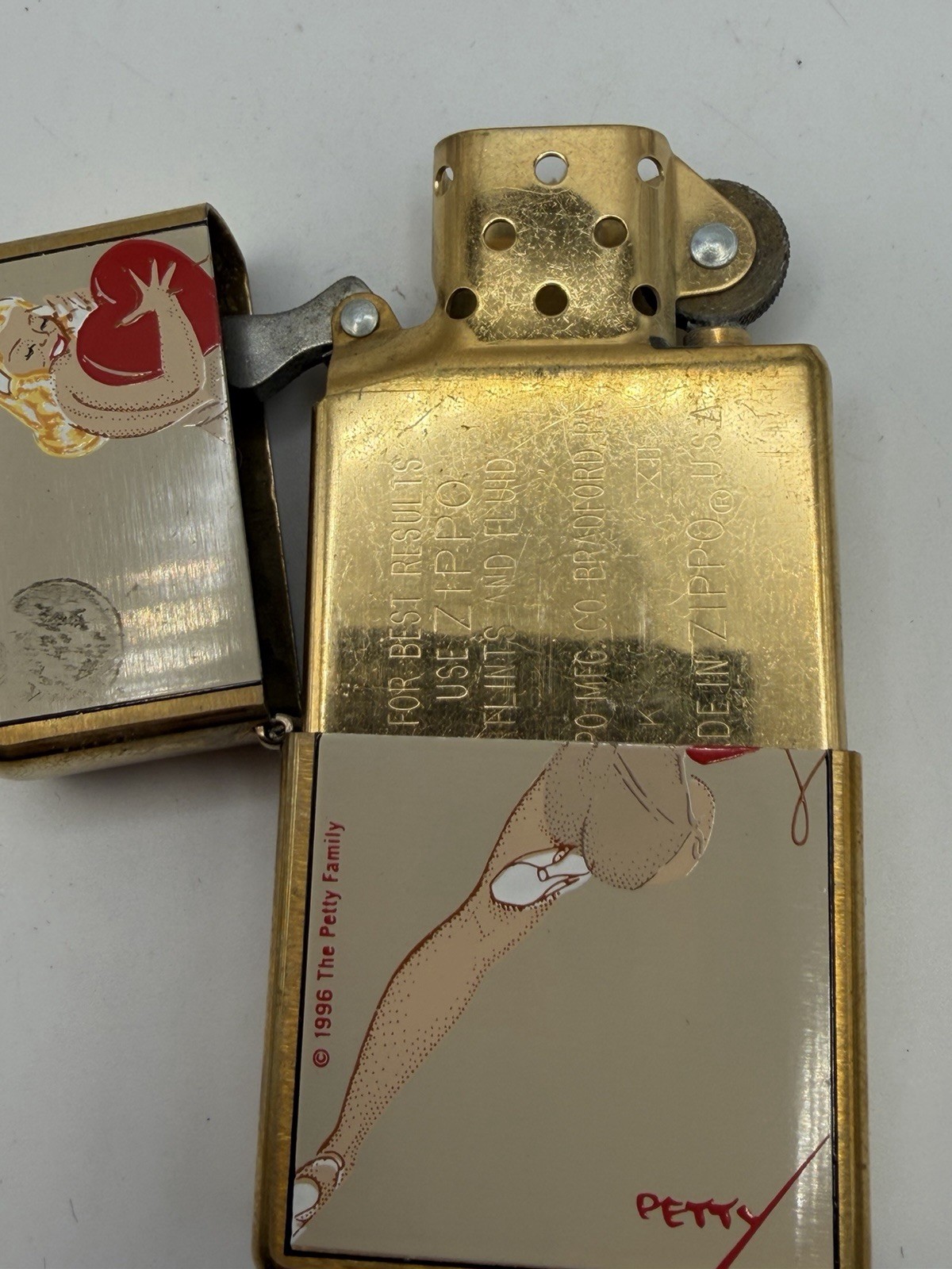 Vintage 1997 Petty Girl Heart Pinup Brass Zippo Lighter NEW