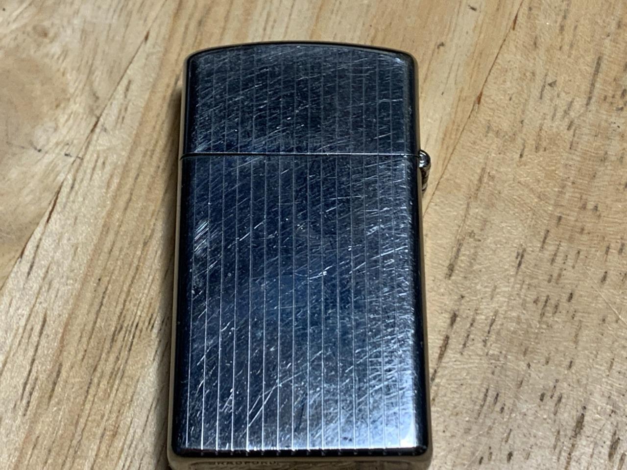 Vintage 1975 Zippo Slim Chrome Etched Lighter L.L.Y. Initials 1 1/4″ x 2 1/4″