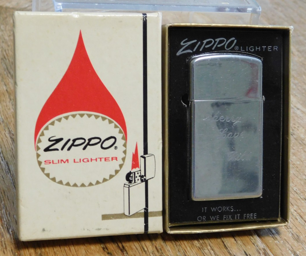 1965 Slim Zippo Cigarette Lighter, with Sales Box. Nice. BUY IT NOW.