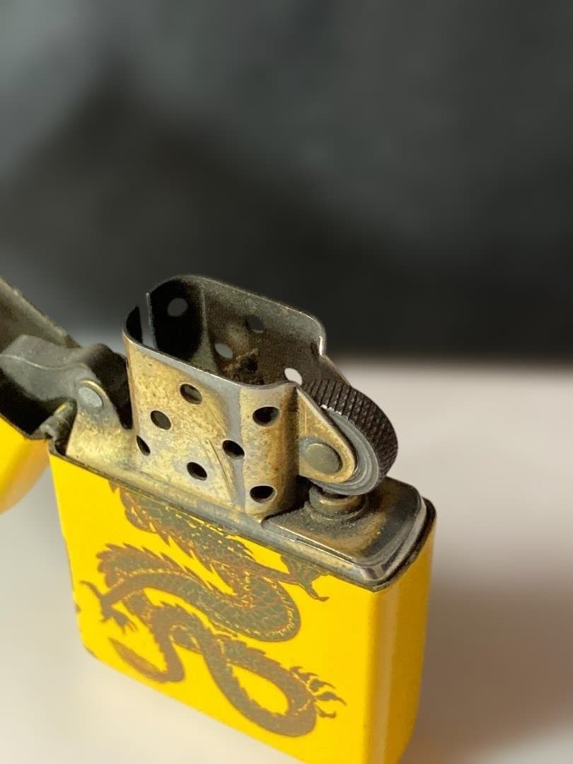 Zippo lighter, featuring a lucky dragon design, comes with a wooden box 2007