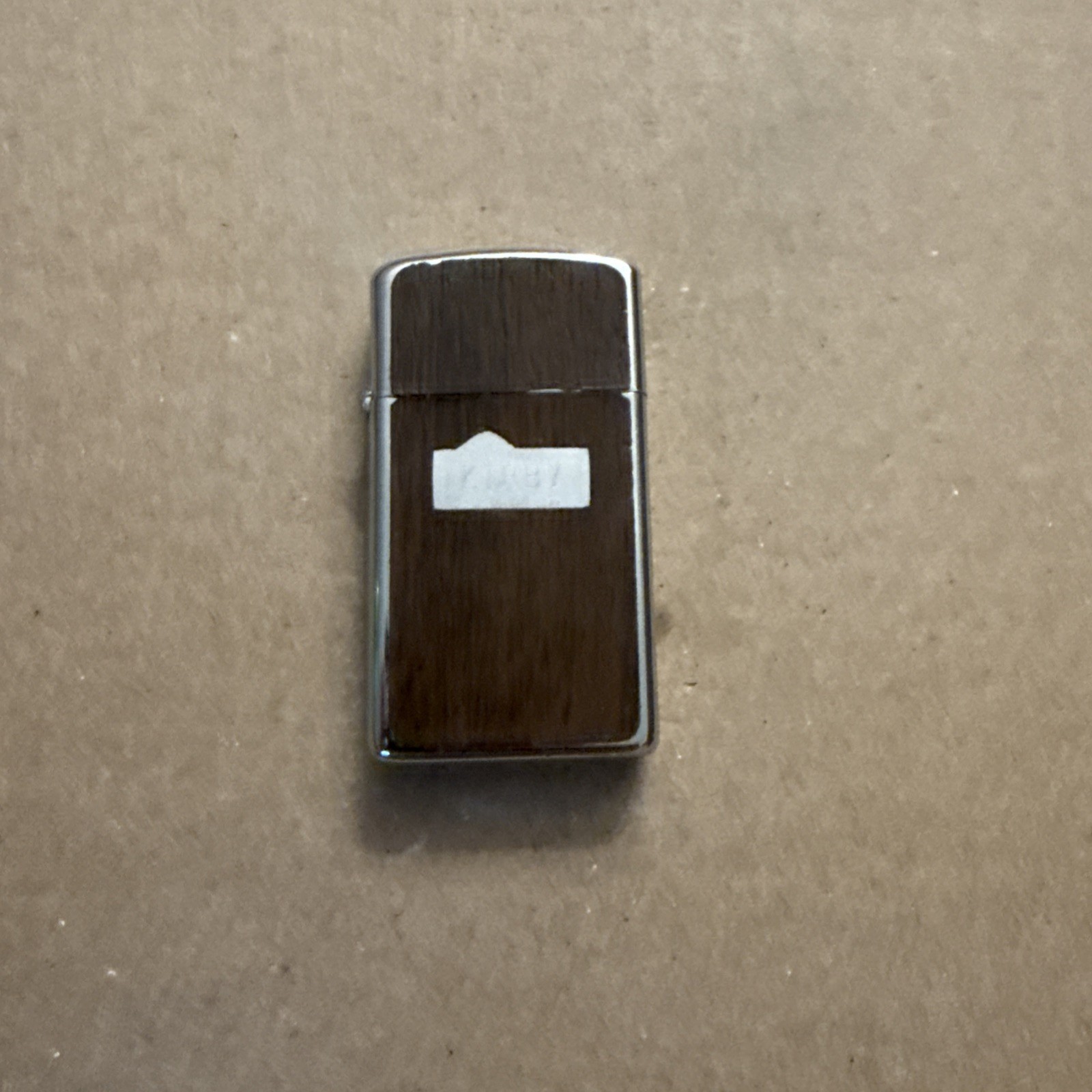 Zippo Windproof Vinyl Woodgrain Slim Silver Cigarette Lighter 1981 “Kirby” C10